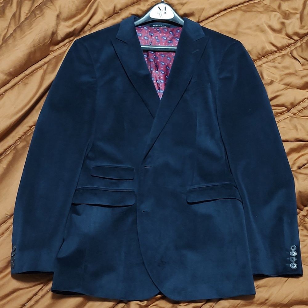Navy Blazer with peak lapels and ticket pocket